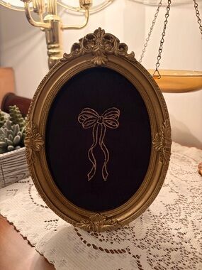 Ornate Gold Oval Frame with Black Velvet Bow Embroidery